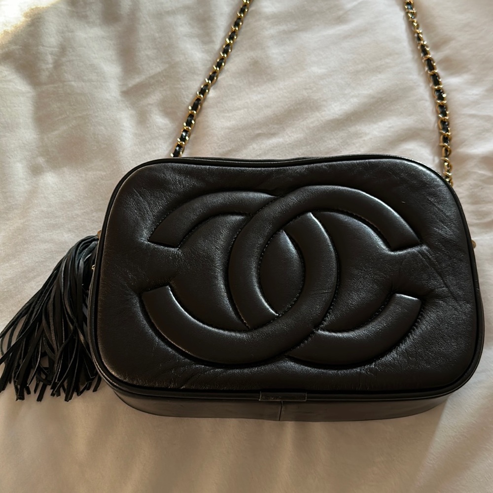 Chanel patent leather bag with tassel in black. authentic